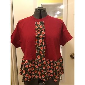 Top, with floral ruffle and decorative front.
